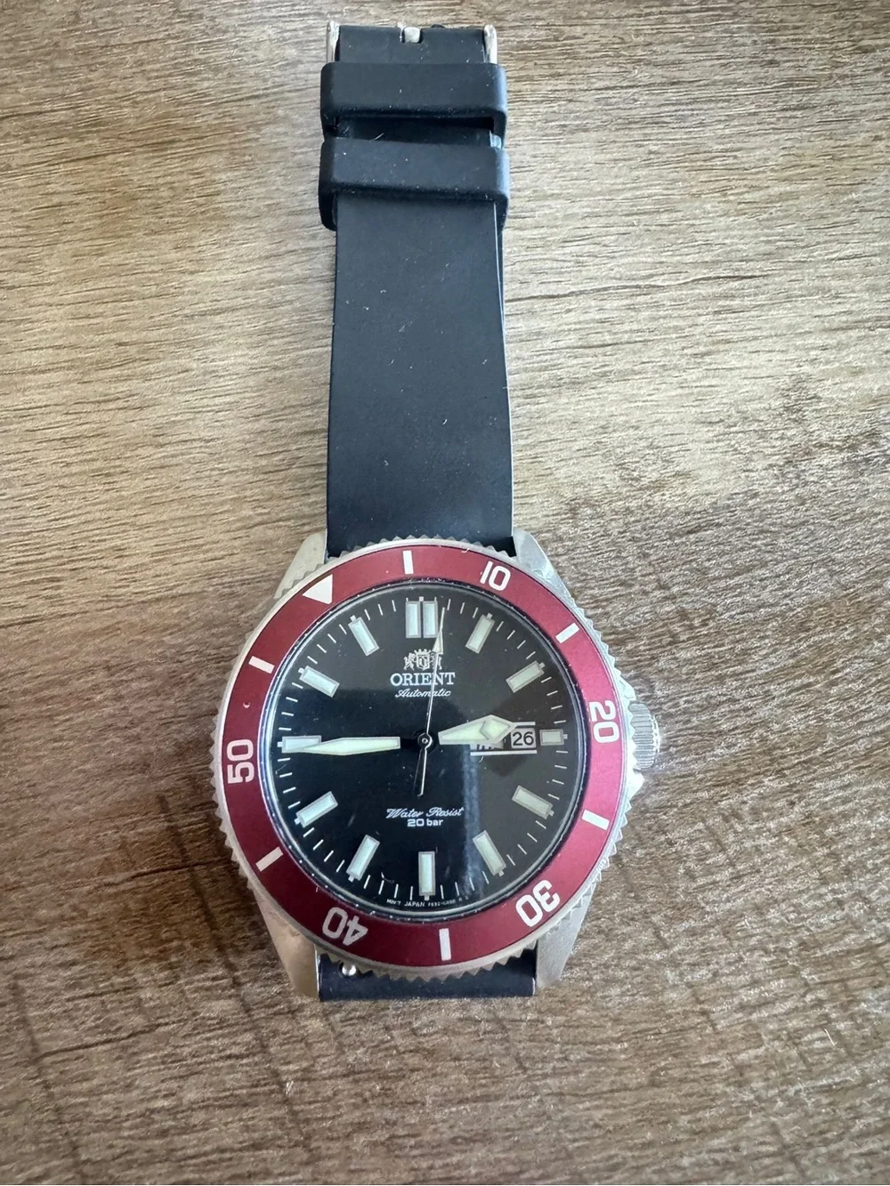 Orient Automatic Dive Watch with Black Dial and Red Bezel